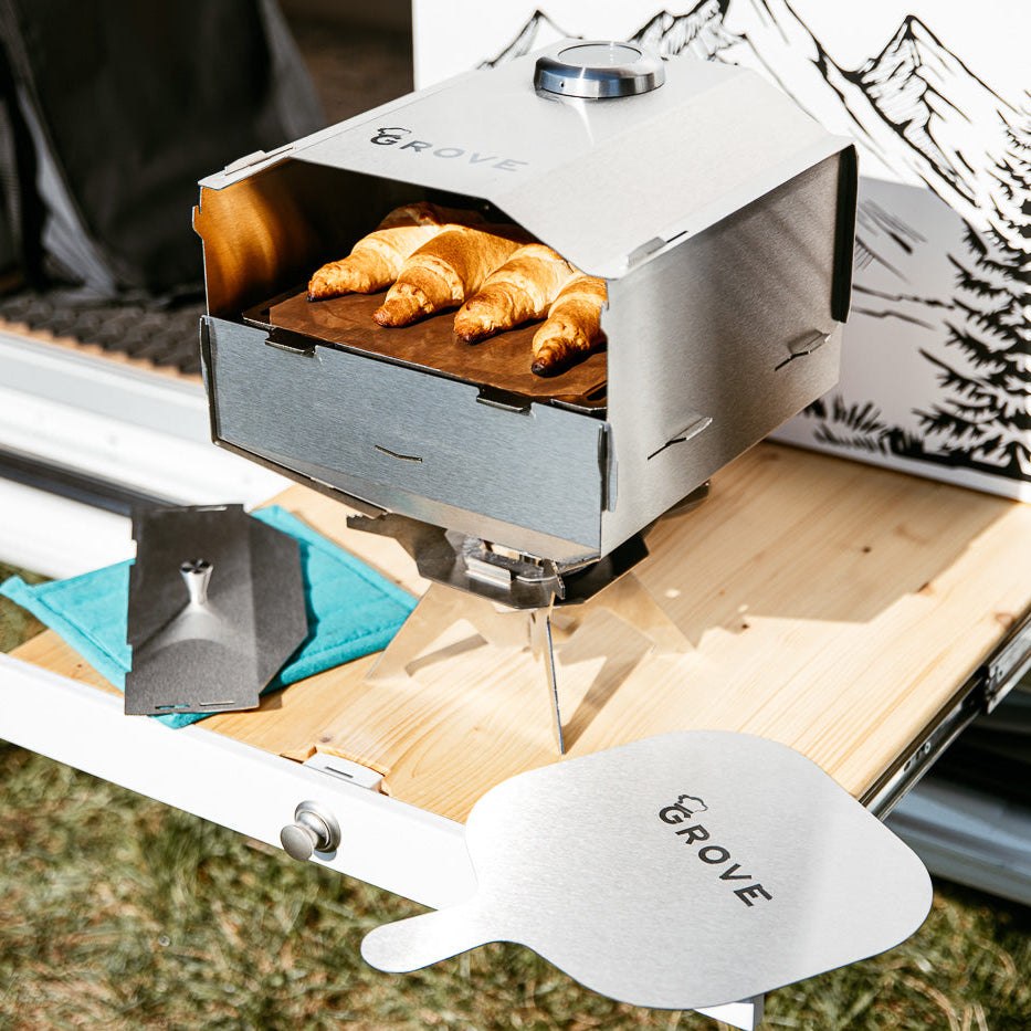 Ambientefoto:
Horst der multifunktionale Campingofen beim Brötchen von Croissants